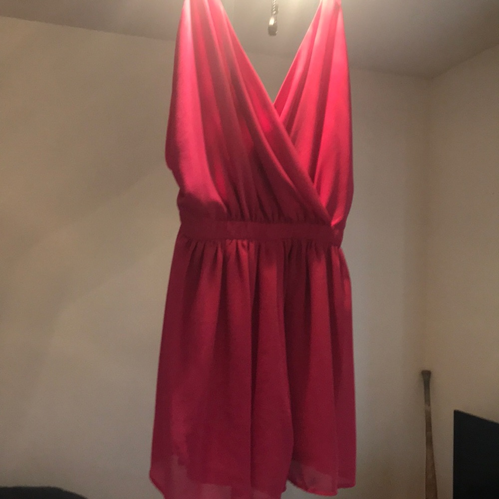 Hot pink romper.